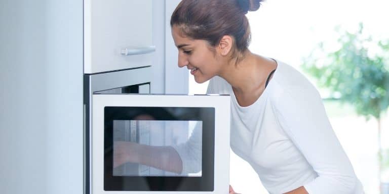 Woman with a microwave