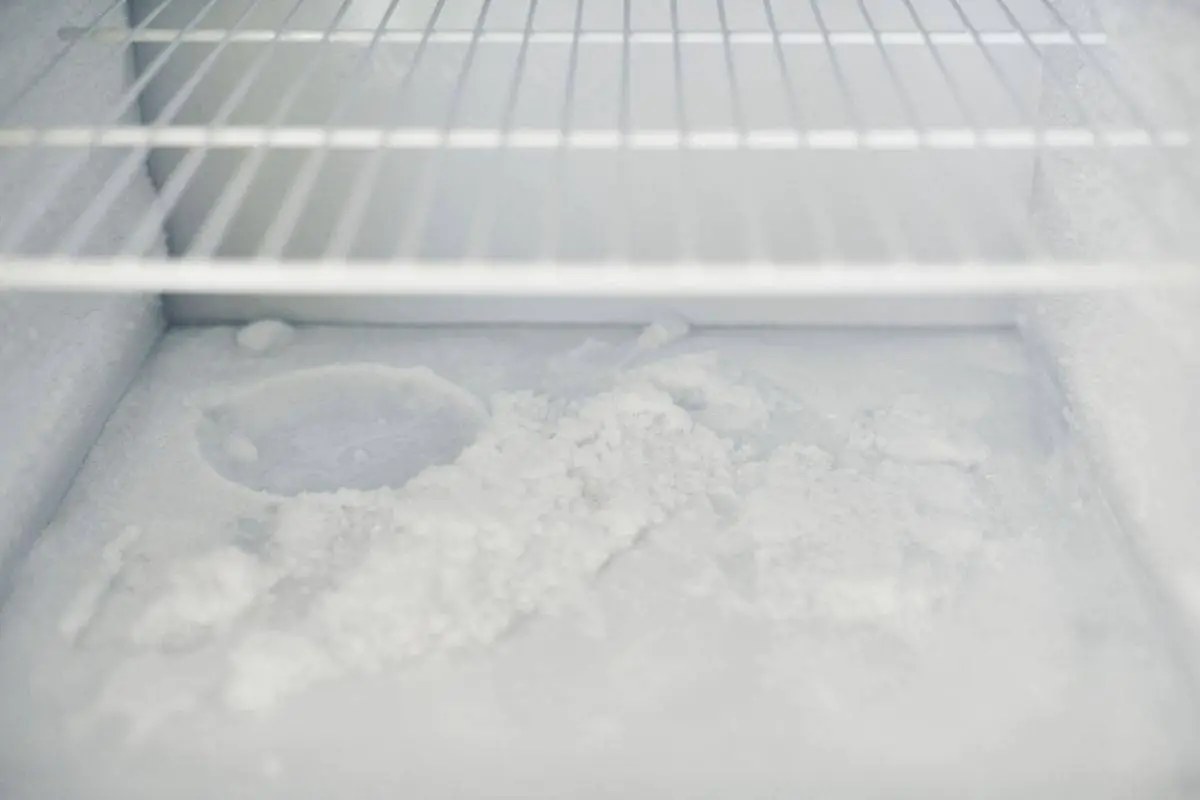 Empty freezer with ice in it