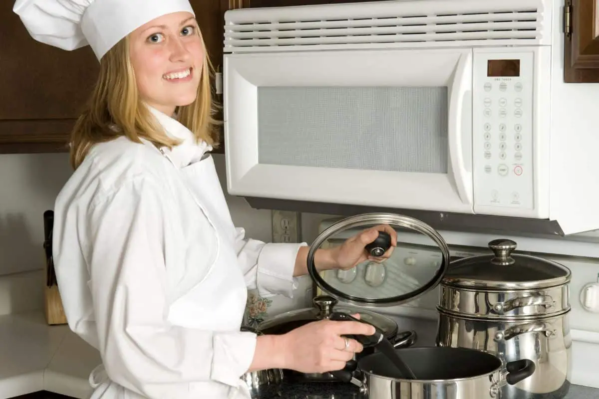 A female chef cooking food